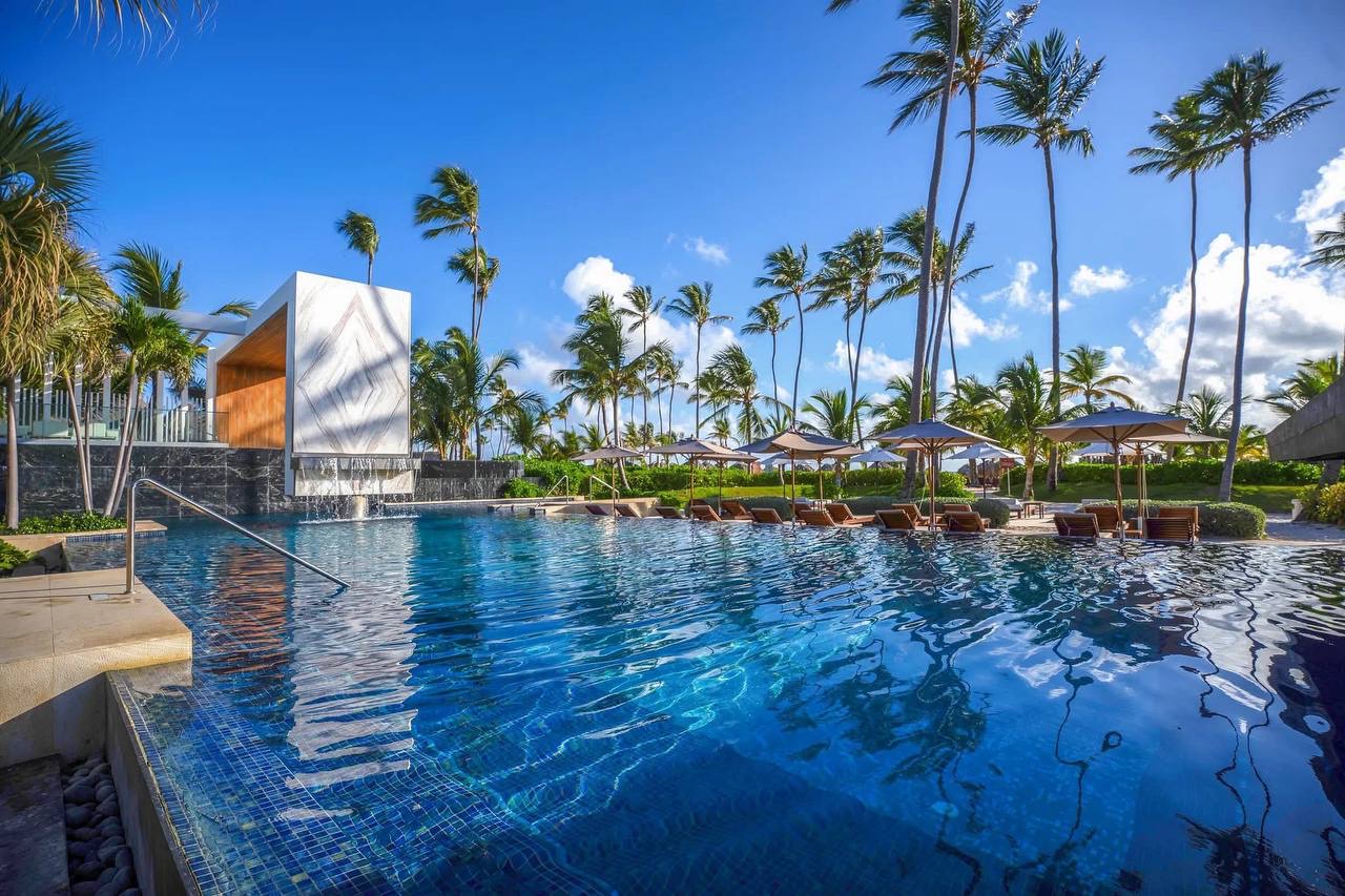 Signature resort pool with palms